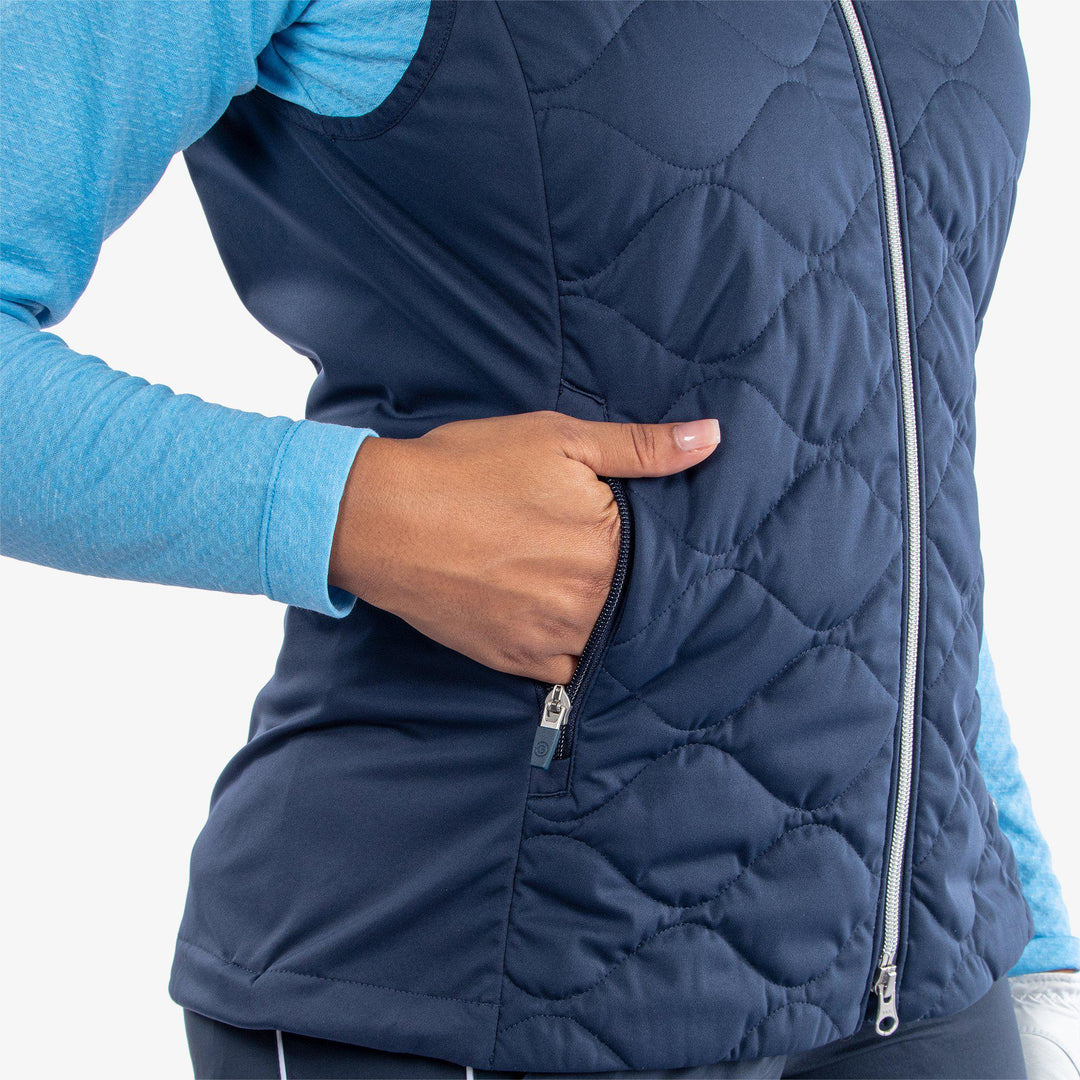 Lucille is a Windproof and water repellent golf vest for Women in the color Navy(4)
