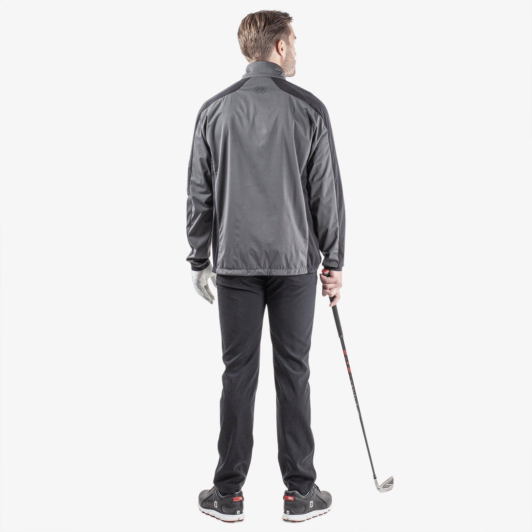 Lawrence is a Windproof and water repellent jacket for  in the color Forged Iron/Black/Red(8)