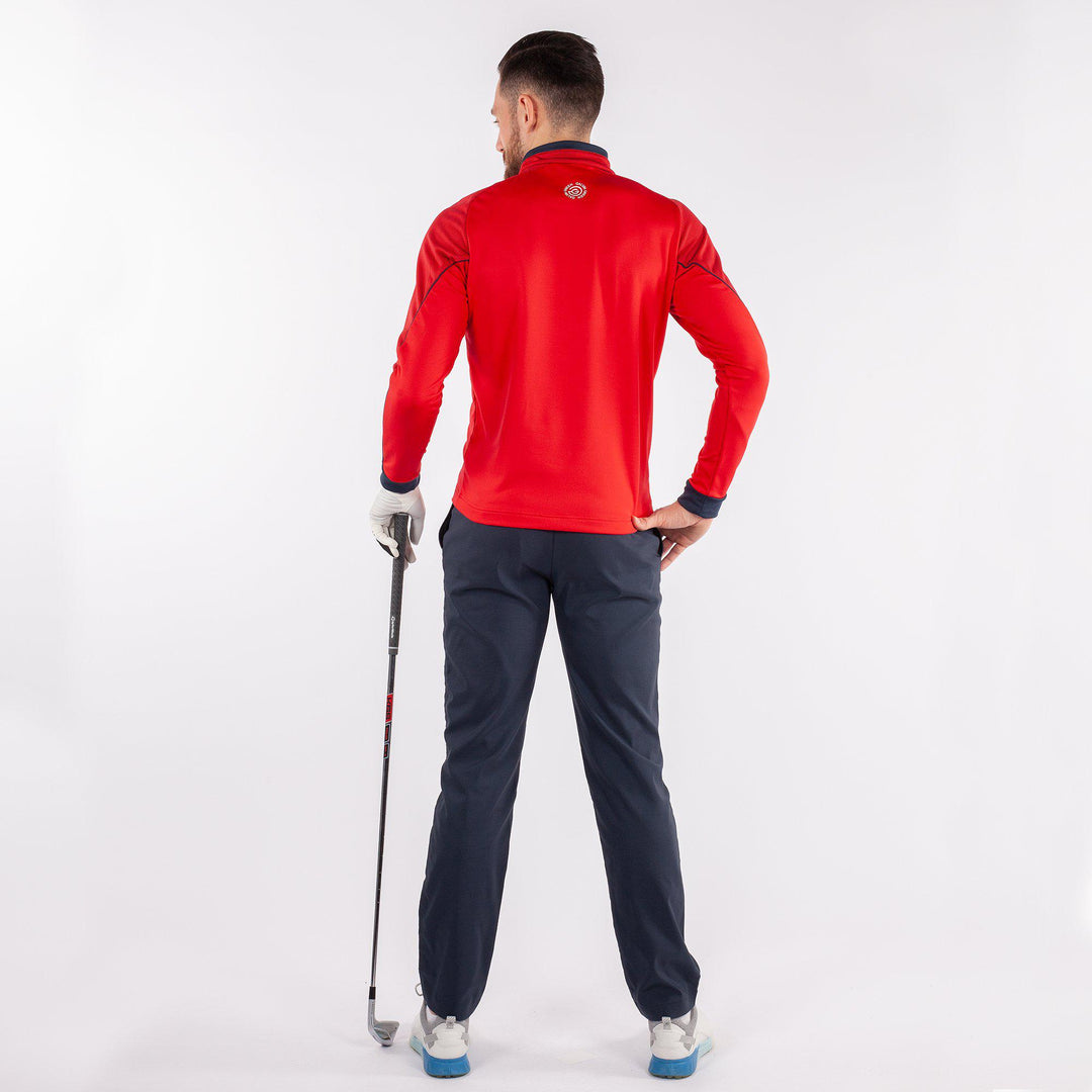 Daxton is a Insulating golf mid layer for Men in the color Imaginary Red(8)