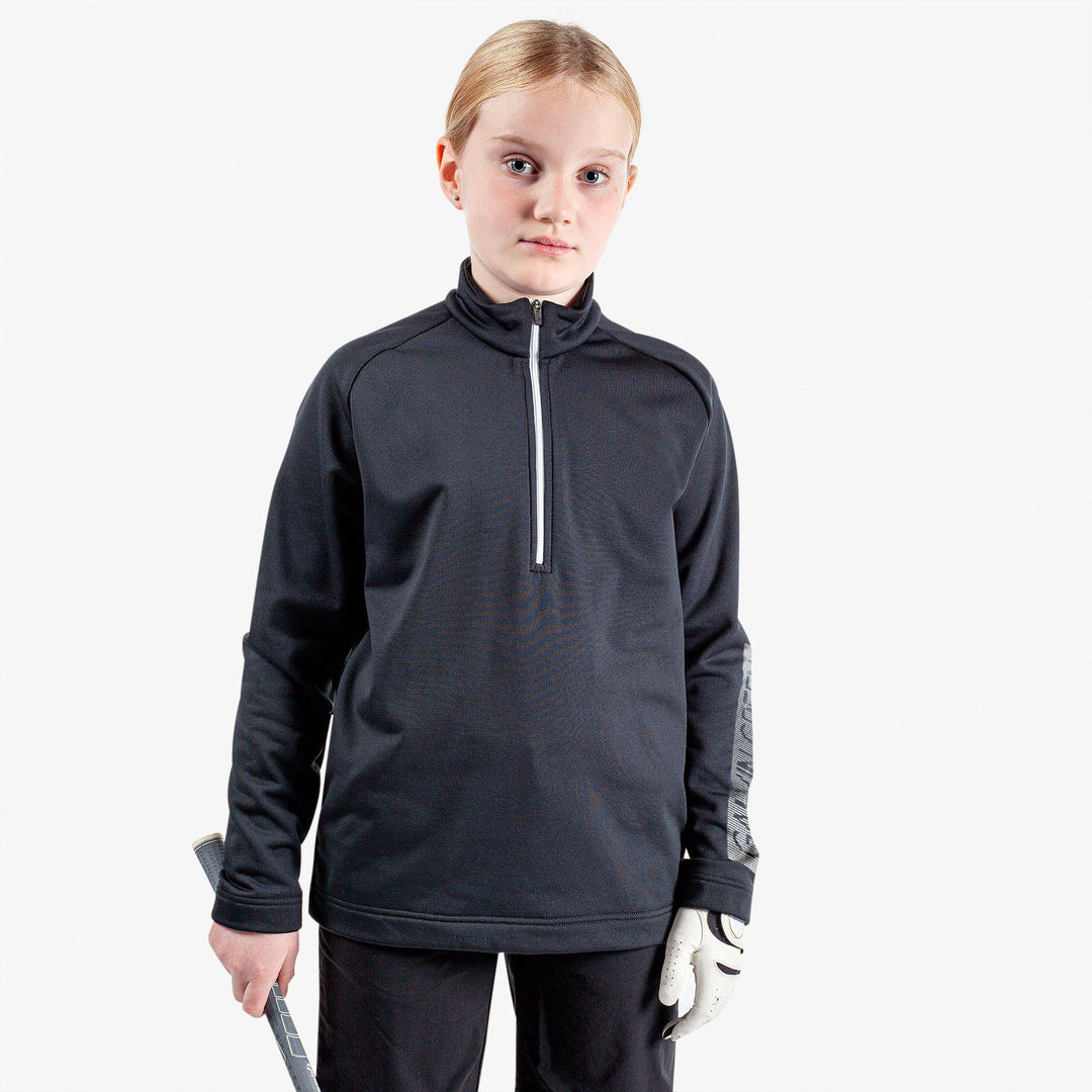 Raz is a Insulating golf mid layer for Juniors in the color Black(1)