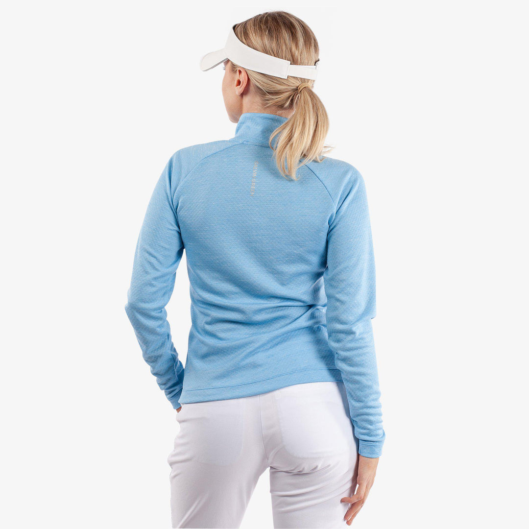 Diora is a Insulating golf mid layer for Women in the color Alaskan Blue Melange(4)
