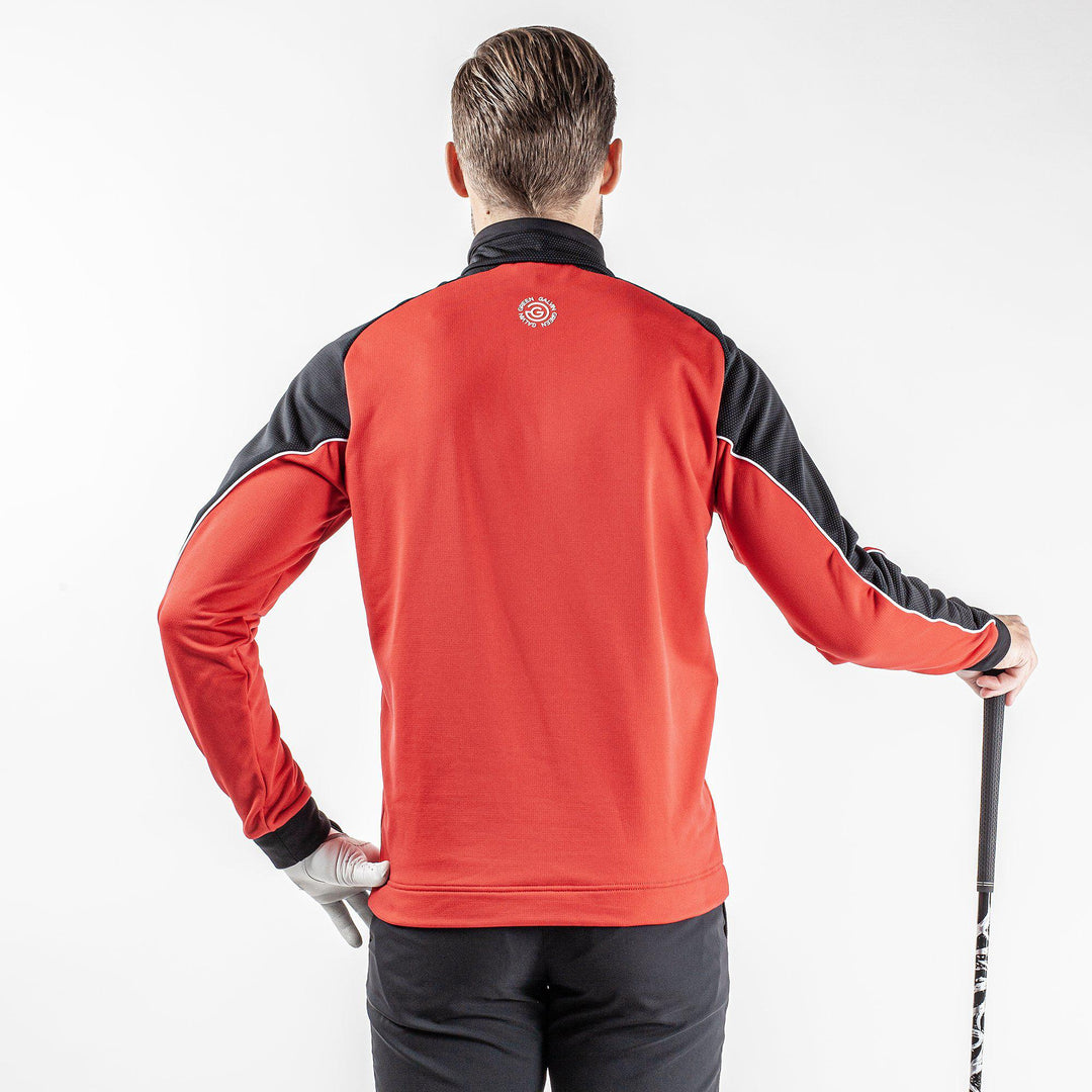 Daxton is a Insulating golf mid layer for Men in the color Red(6)