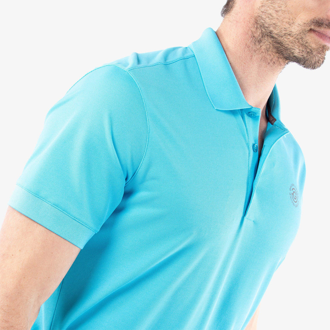 Maximilian is a Breathable short sleeve golf shirt for Men in the color Aqua(3)