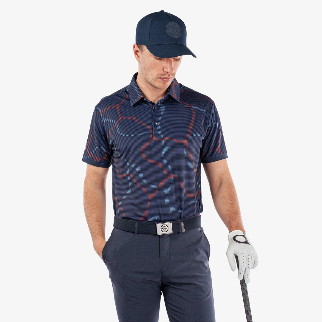 Markos is a Breathable short sleeve golf shirt for Men in the color Navy/Orange(1)