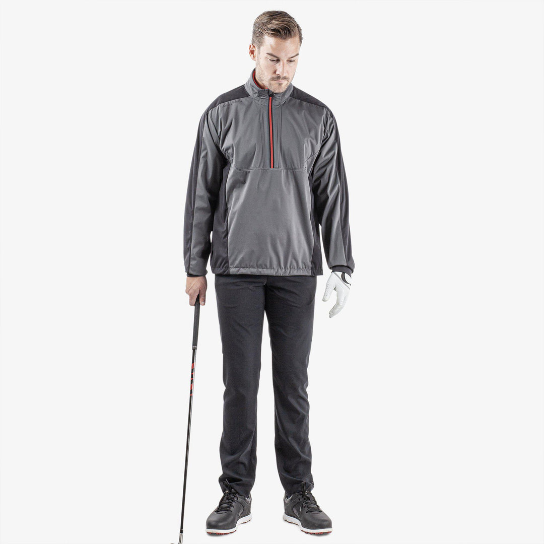 Lawrence is a Windproof and water repellent jacket for  in the color Forged Iron/Black/Red(2)