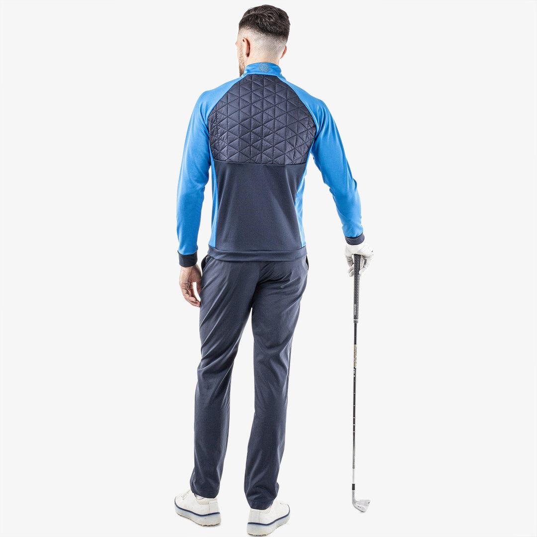 Dexter is a Insulating golf mid layer for Men in the color Navy/Blue(8)