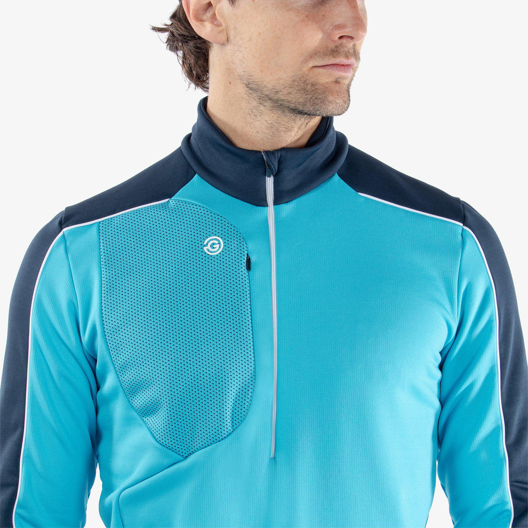 Dave is a Insulating golf mid layer for Men in the color Aqua/Navy(3)