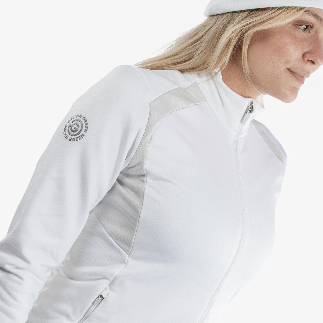 Destiny is a Insulating golf mid layer for Women in the color White/Cool Grey(3)