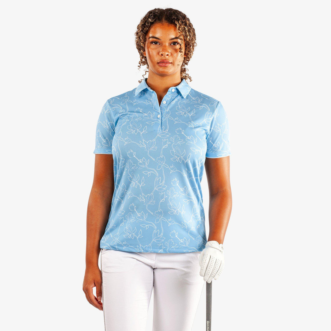 Mallory is a Breathable short sleeve golf shirt for Women in the color Alaskan Blue/White(1)