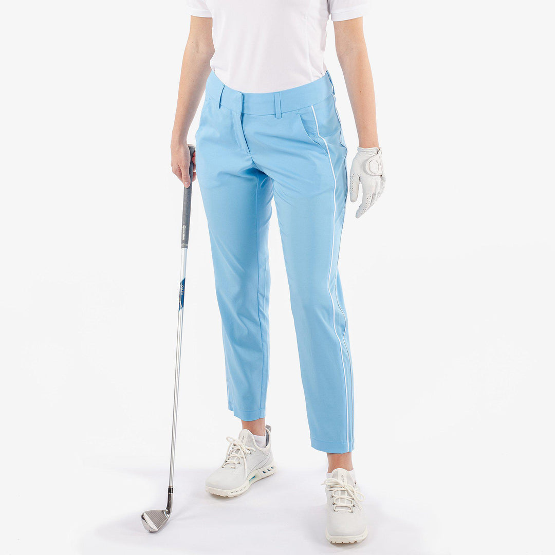 Nicole is a Breathable golf pants for Women in the color Alaskan Blue/White(1)