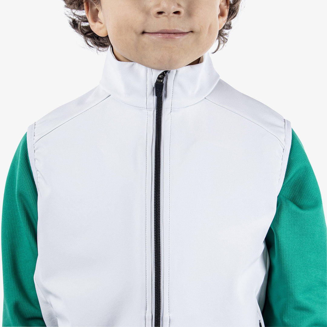 Rio is a Windproof and water repellent golf vest for Juniors in the color White(4)