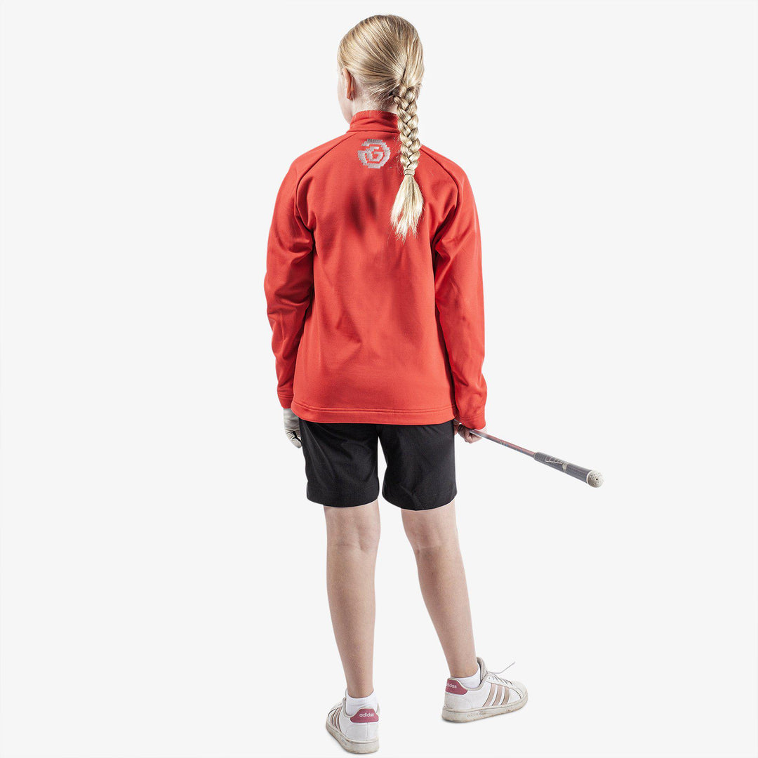 Raz is a Insulating golf mid layer for Juniors in the color Red(7)