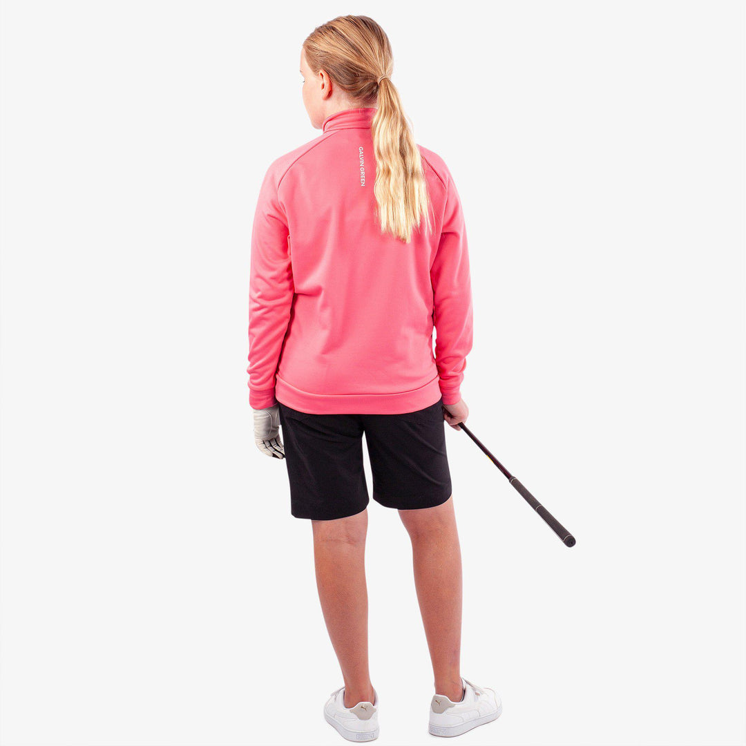 Rex is a Insulating golf mid layer for Juniors in the color Camelia Rose/White(8)