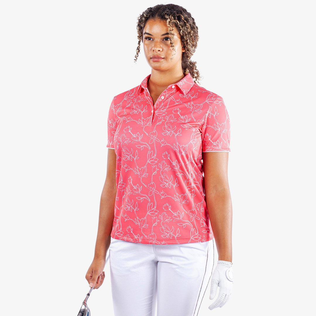 Mallory is a Breathable short sleeve golf shirt for Women in the color Camelia Rose/White(1)