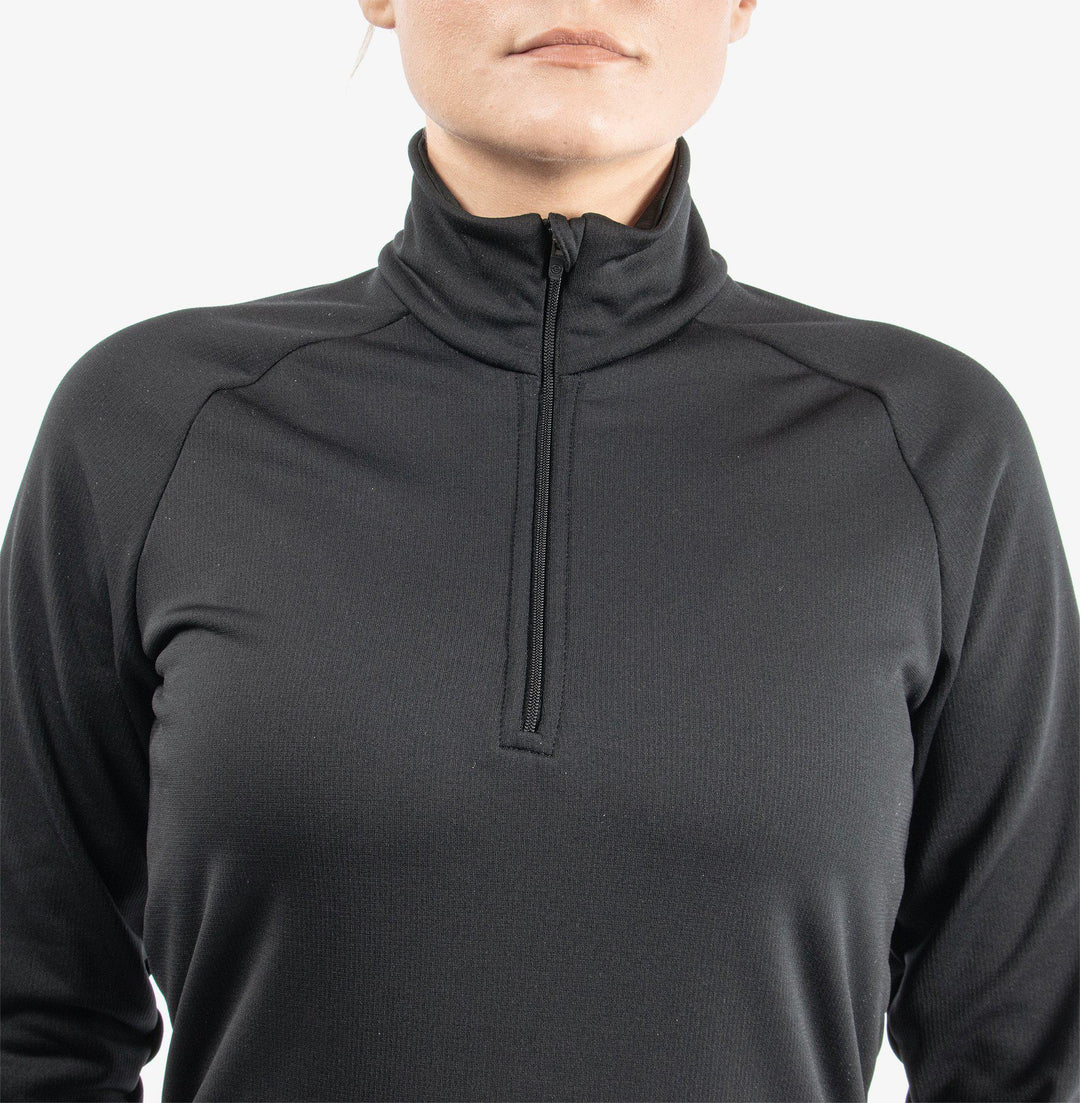 Dolly is a Insulating golf mid layer for Women in the color Black(4)