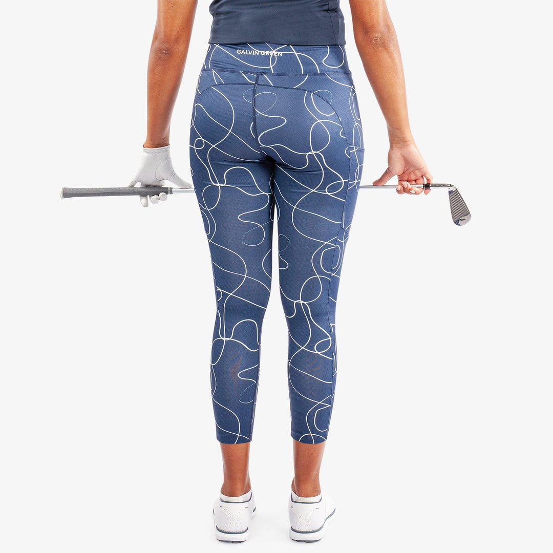 Nicoline is a Breathable and stretchy golf leggings for Women in the color Navy/White(3)