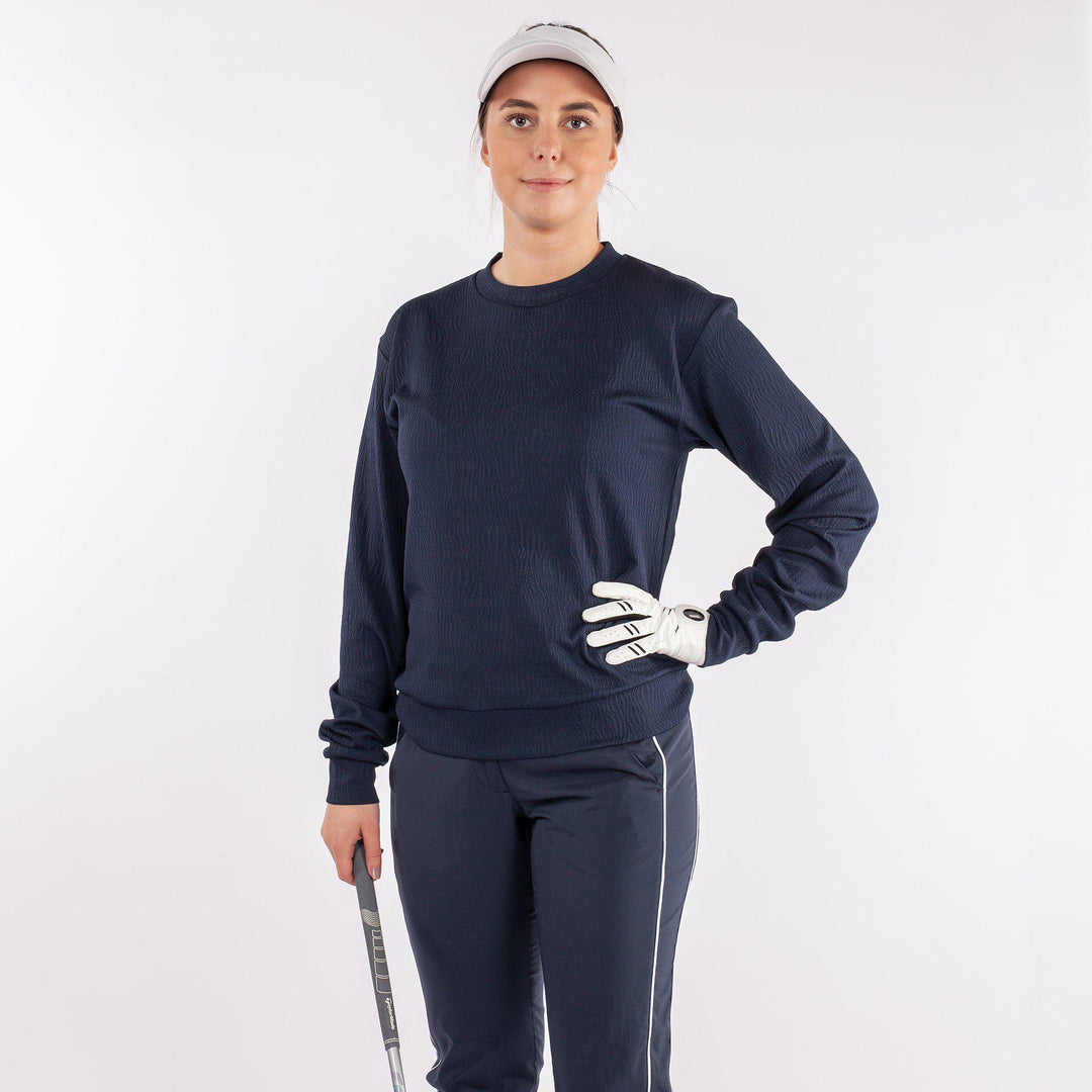 Dalia is a Insulating mid layer for Women in the color Navy(1)