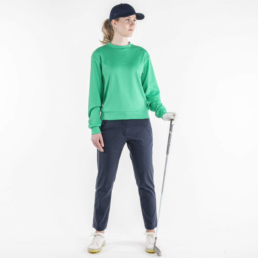 Dalia is a Insulating mid layer for Women in the color Golf Green(2)