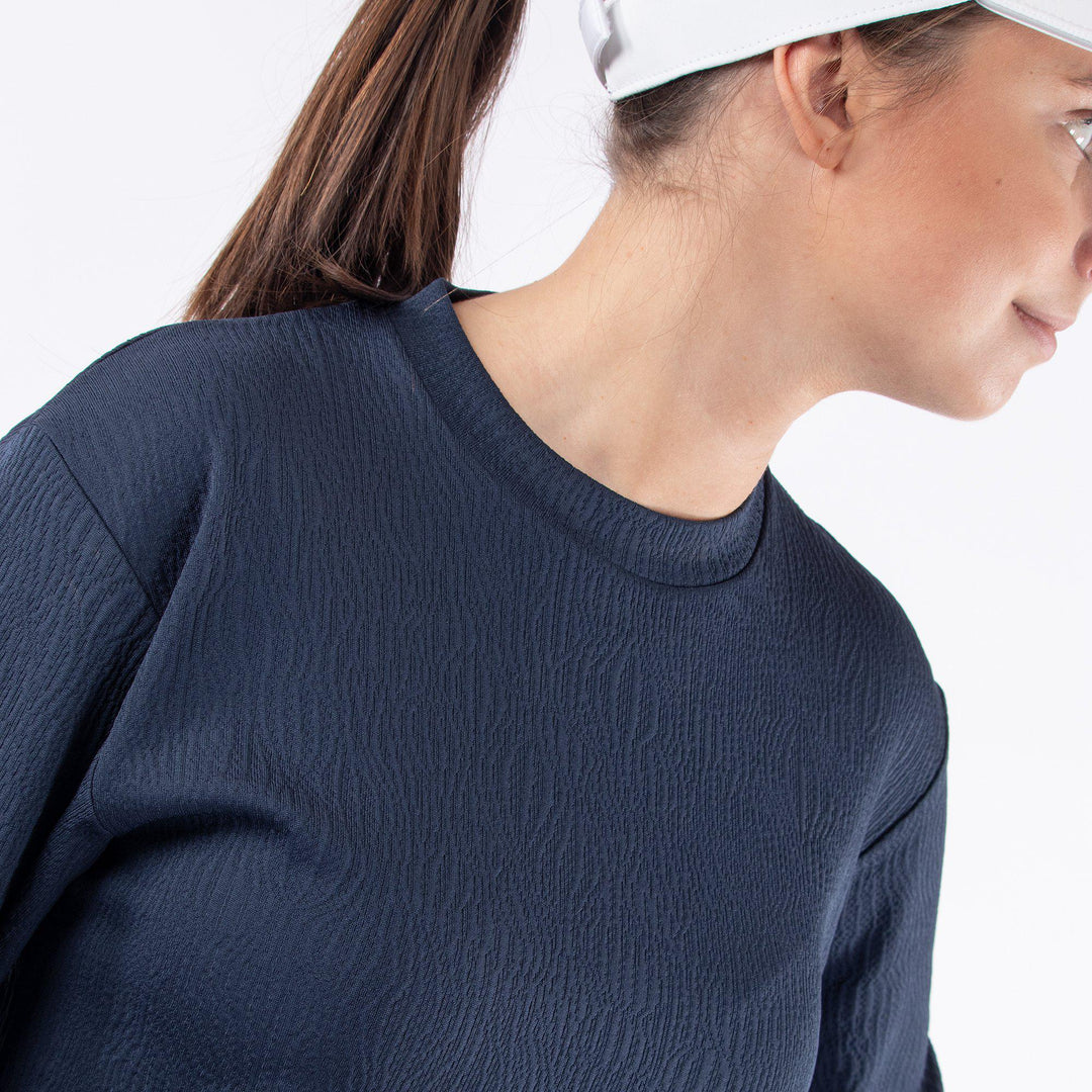 Dalia is a Insulating mid layer for Women in the color Navy(2)