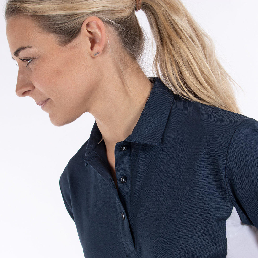 Maia is a Breathable short sleeve golf shirt for Women in the color Navy(2)