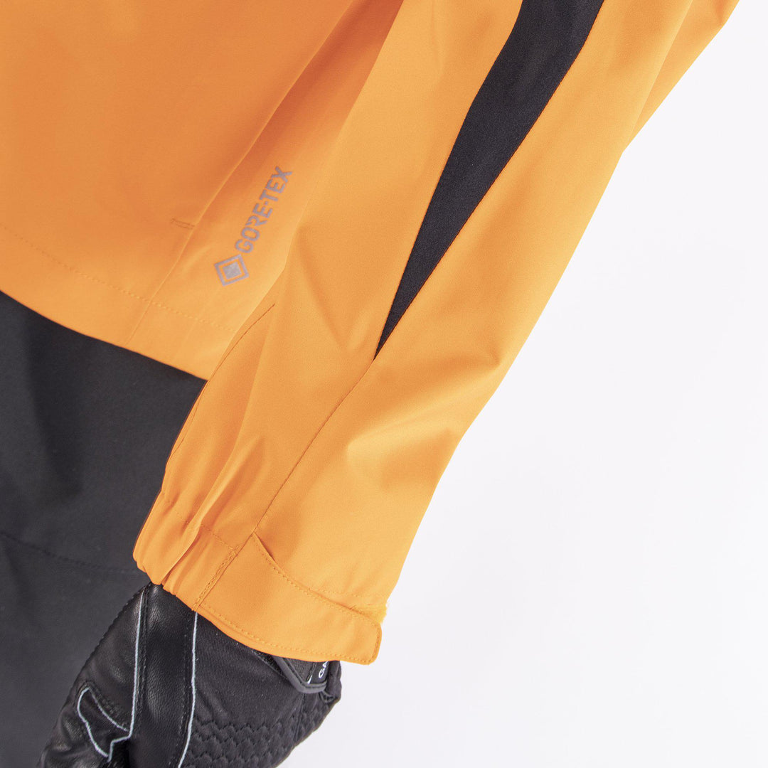 Robert is a Waterproof jacket for Juniors in the color Orange(3)