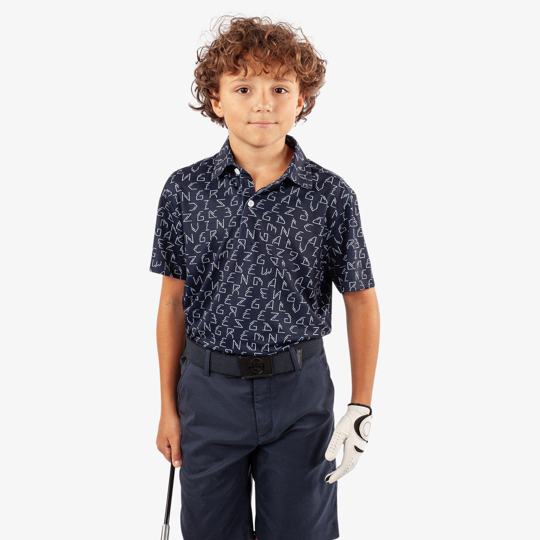 Rickie is a Breathable short sleeve golf shirt for Juniors in the color Navy(1)