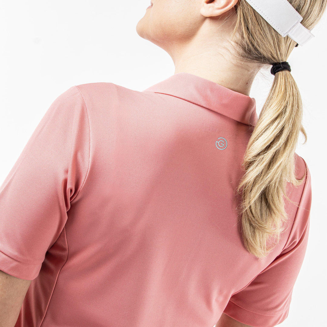 Melody is a Breathable short sleeve golf shirt for Women in the color Coral(6)