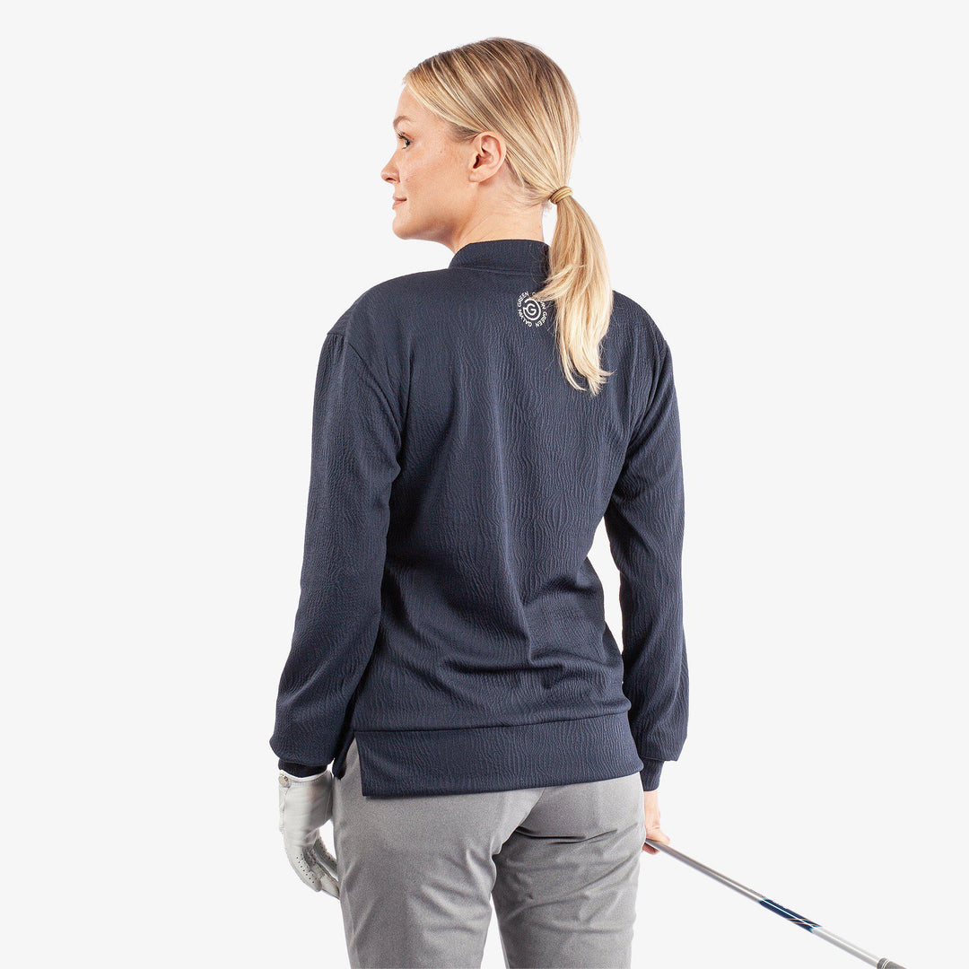 Donya is a Insulating golf mid layer for Women in the color Navy(6)