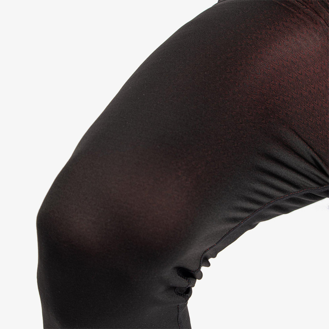 Elof is a Thermal base layer golf leggings for Men in the color Black/Red(5)