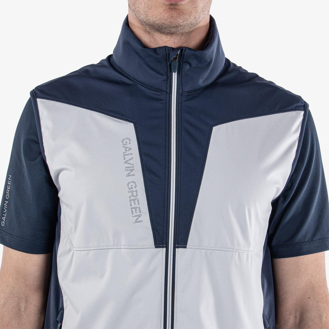 Lathan is a Windproof and water repellent golf vest for Men in the color Cool Grey/Navy(4)