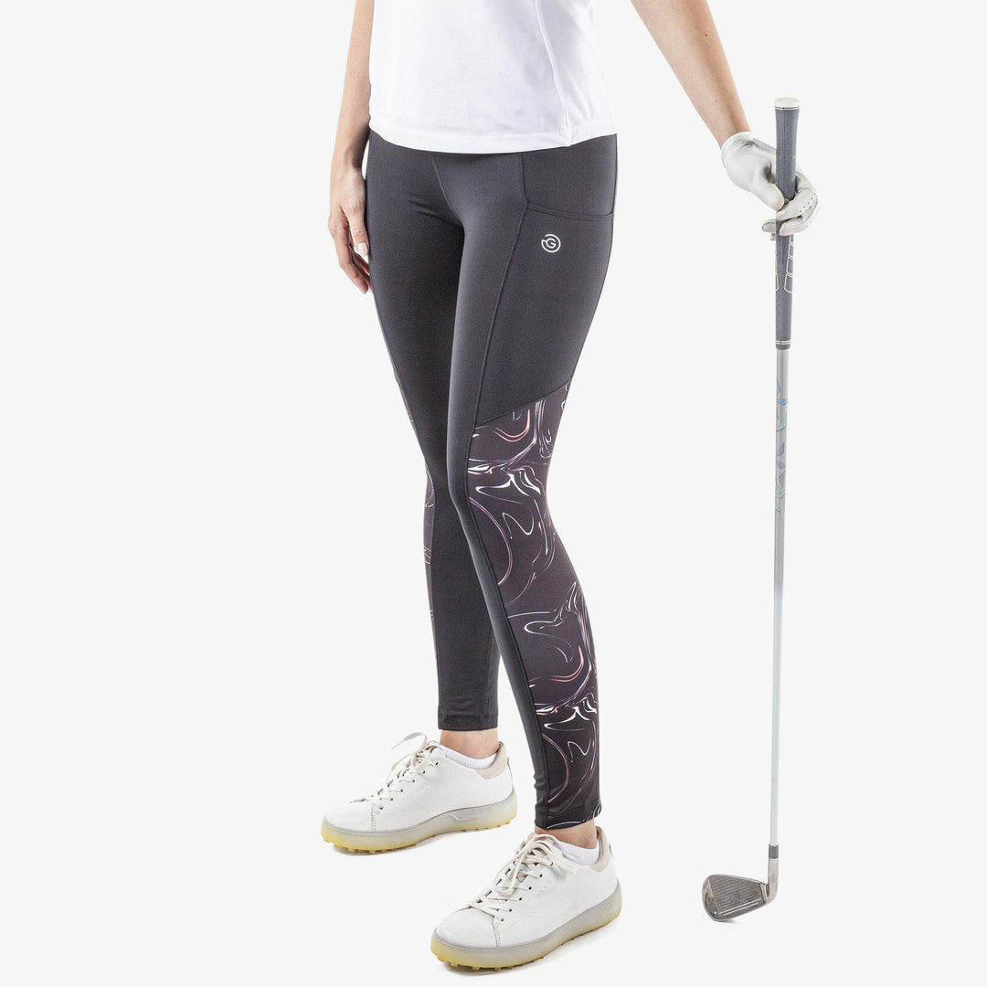 Nicci is a Breathable and stretchy golf leggings for Women in the color Black(1)