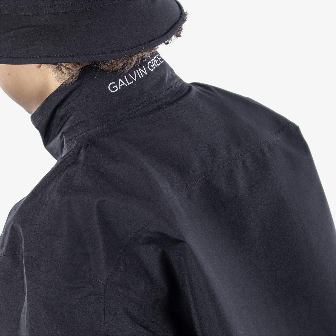 Robert is a Waterproof jacket for Juniors in the color Black/Red(7)