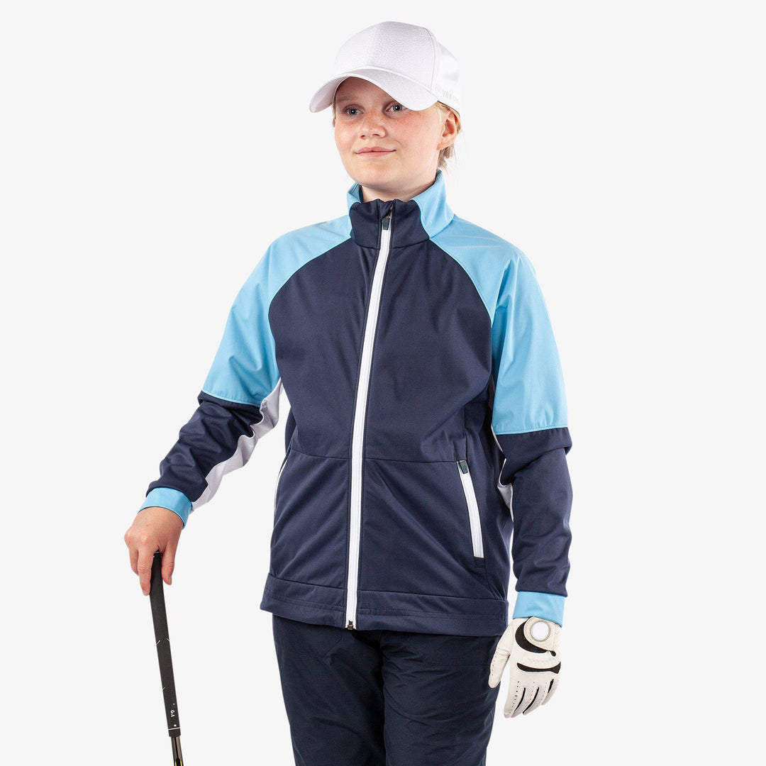 Remi is a Windproof and water repellent golf jacket for Juniors in the color Navy/Alaskan Blue/Wh(1)