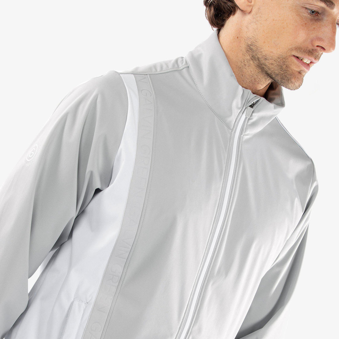 Lucien is a Windproof and water repellent golf jacket for Men in the color Cool Grey/White(3)