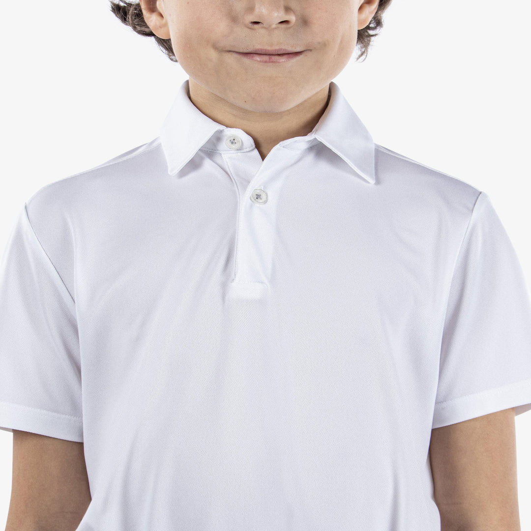 Rylan is a Breathable short sleeve golf shirt for Juniors in the color White(3)