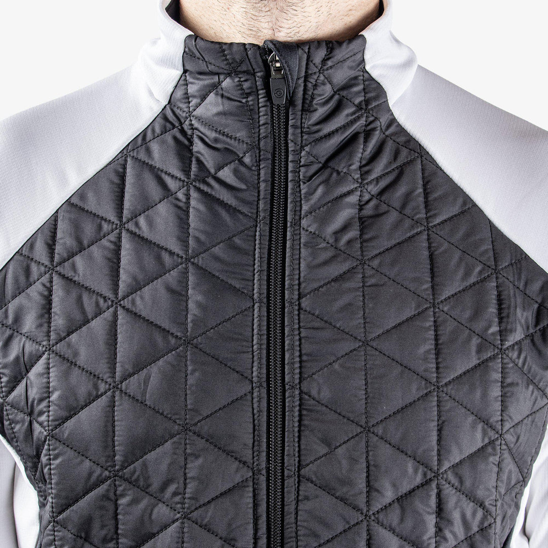 Dexter is a Insulating golf mid layer for Men in the color Black/White(3)
