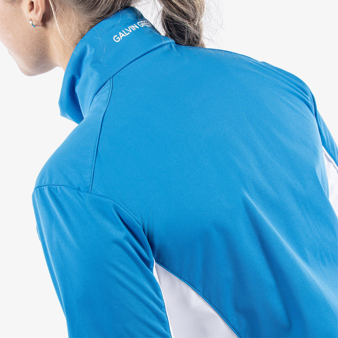 Larissa is a Windproof and water repellent golf jacket for Women in the color Blue/White(9)