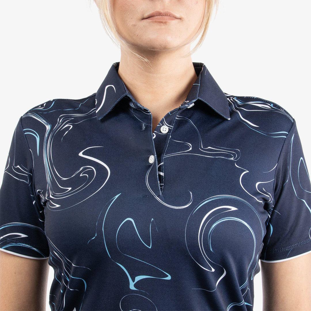 Malena is a Breathable short sleeve golf shirt for Women in the color Navy/White/Blue Bell(4)