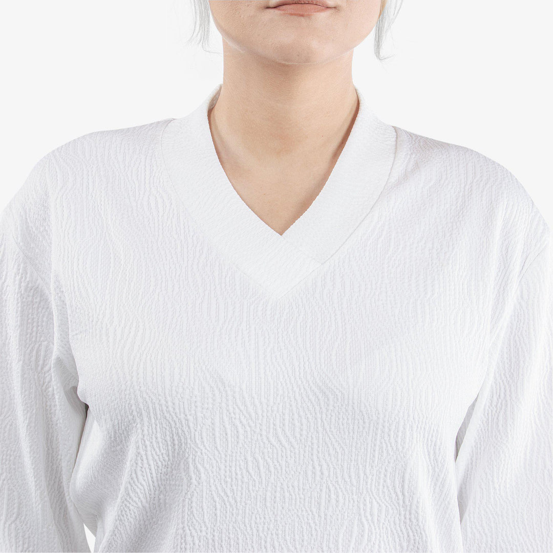 Donya is a Insulating golf mid layer for Women in the color White(4)
