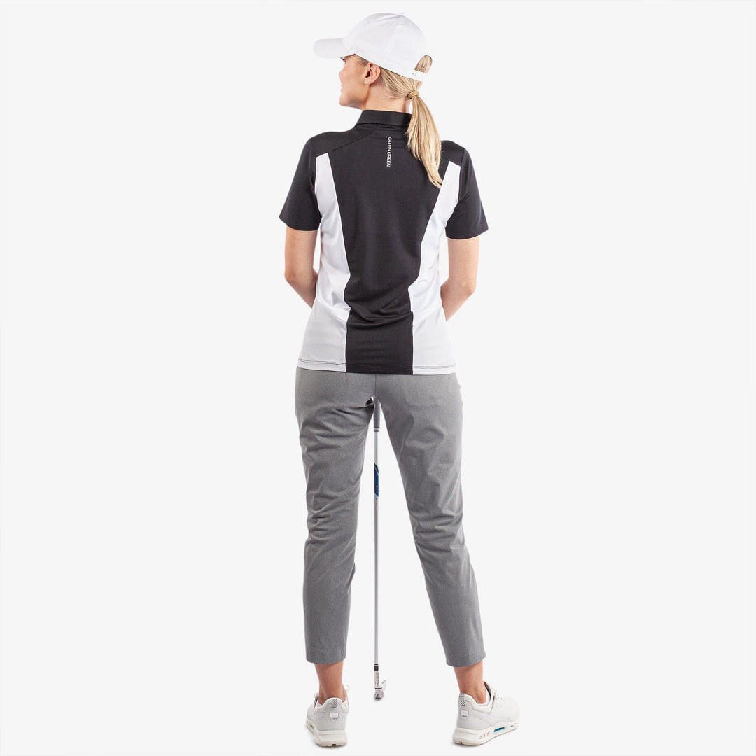 Melanie is a Breathable short sleeve golf shirt for Women in the color Black/White/Cool Grey(7)