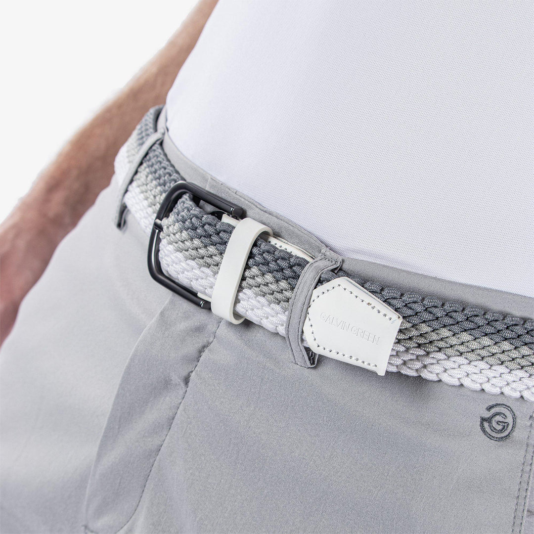 Will is a Elastic golf belt in the color White/Cool Grey/Sharkskin(4)