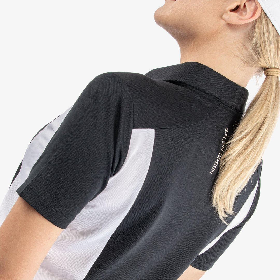 Melanie is a Breathable short sleeve golf shirt for Women in the color Black/White/Cool Grey(6)
