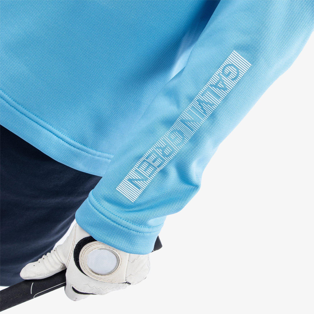 Raz is a Insulating golf mid layer for Juniors in the color Alaskan Blue(4)