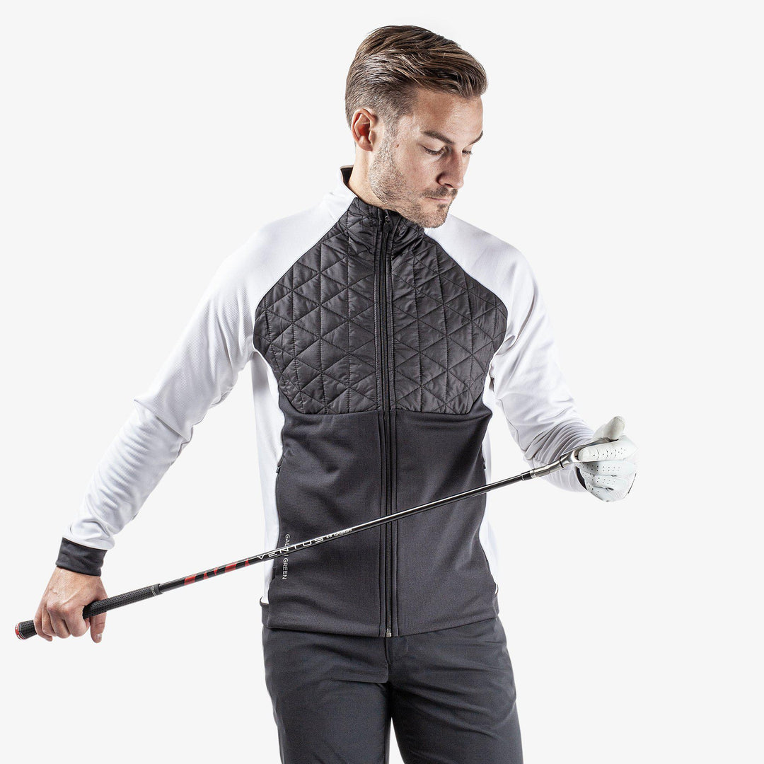 Dexter is a Insulating golf mid layer for Men in the color Black/White(1)