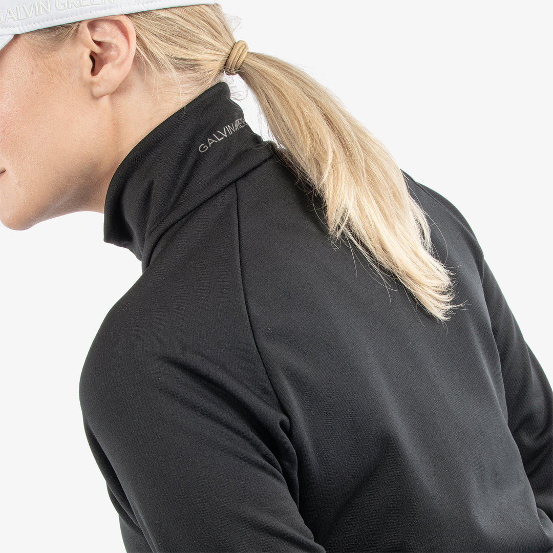 Dolly is a Insulating golf mid layer for Women in the color Black(6)
