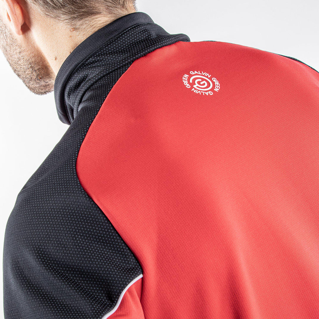 Daxton is a Insulating golf mid layer for Men in the color Red(7)