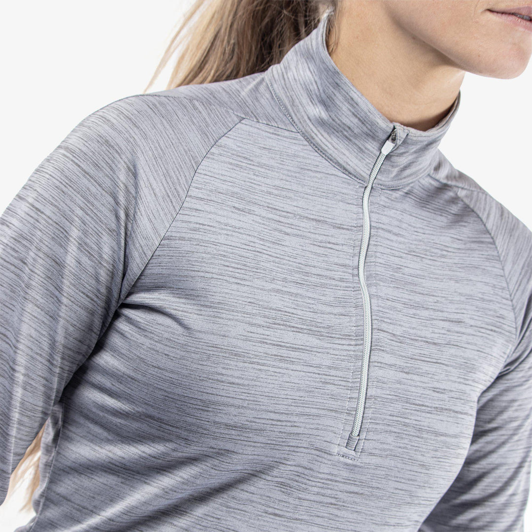Dina is a Insulating golf mid layer for Women in the color Light Grey(3)