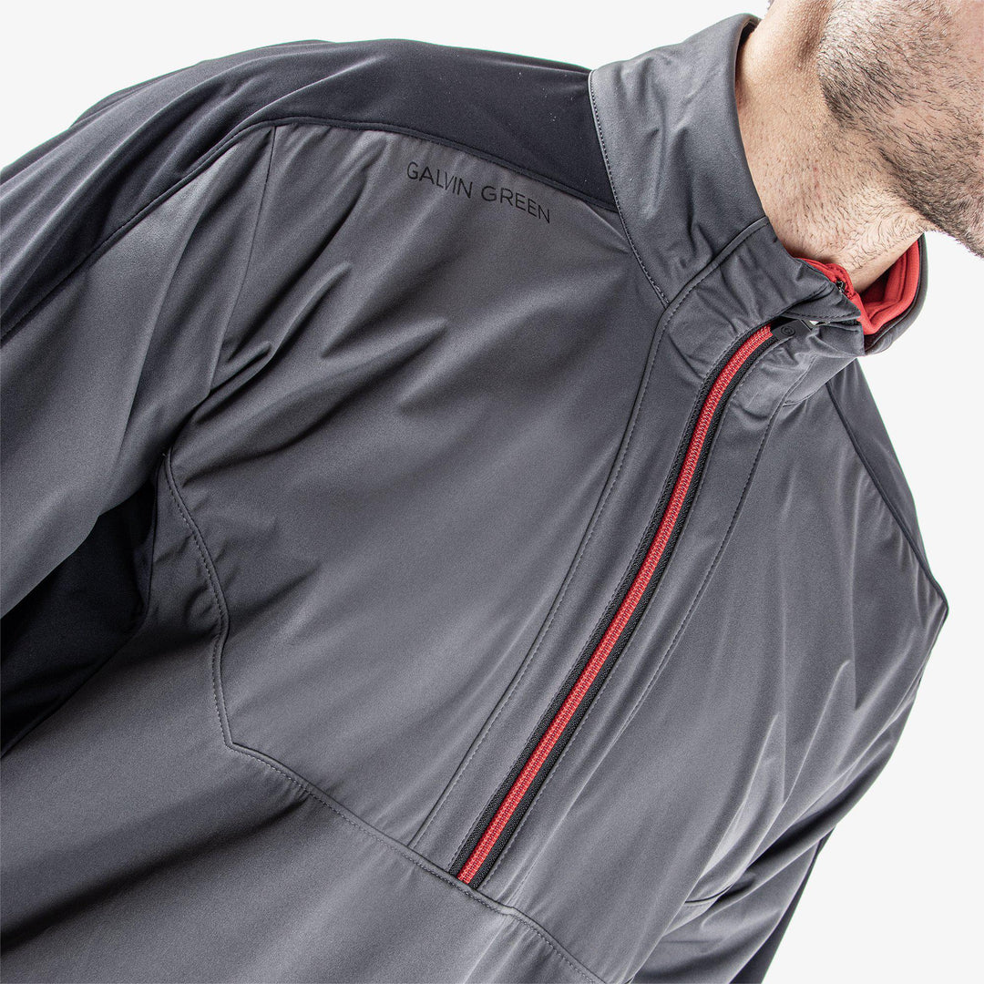 Lawrence is a Windproof and water repellent golf jacket for Men in the color Forged Iron/Black/Red(4)