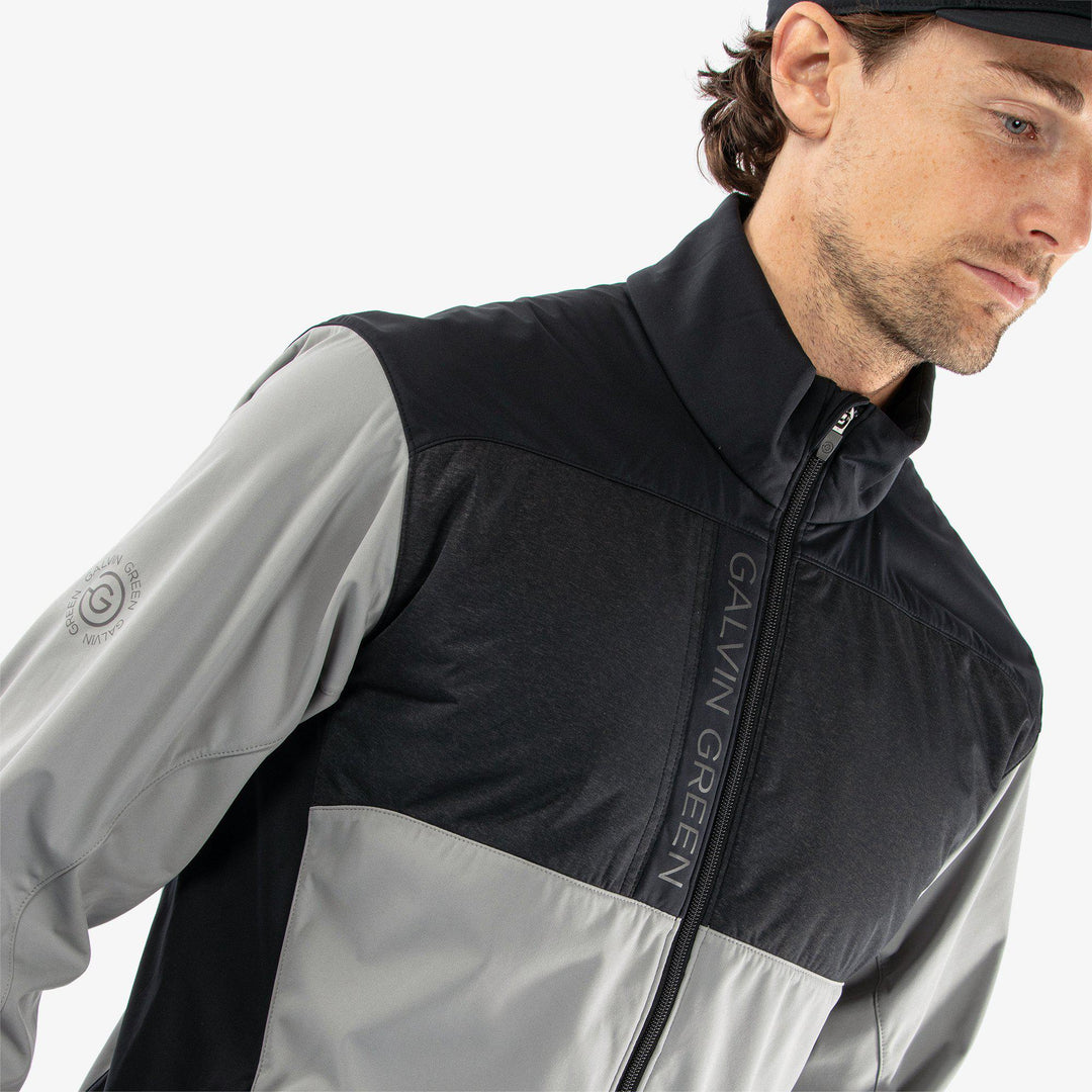 Layton is a Windproof and water repellent golf jacket for Men in the color Sharkskin/Black(3)
