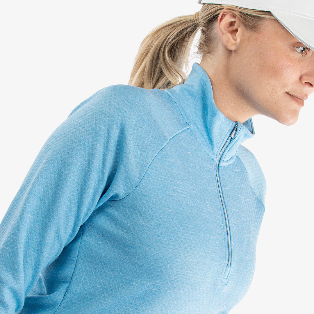Diora is a Insulating golf mid layer for Women in the color Alaskan Blue Melange(3)